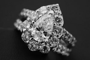 Large stoned diamond engagement ring against black background